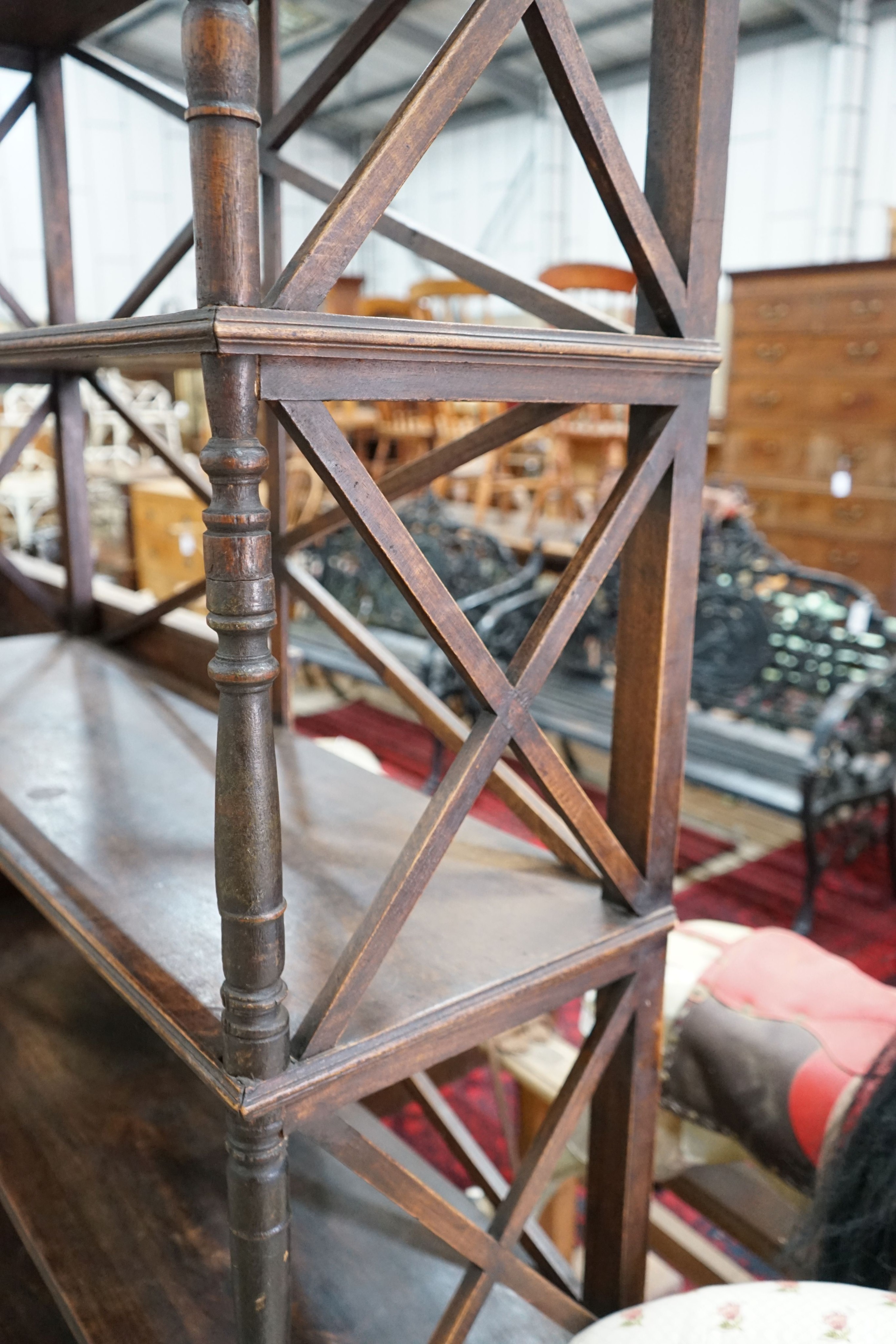 A Regency style four tier open bookcase, width 120cm, depth 38cm, height 184cm